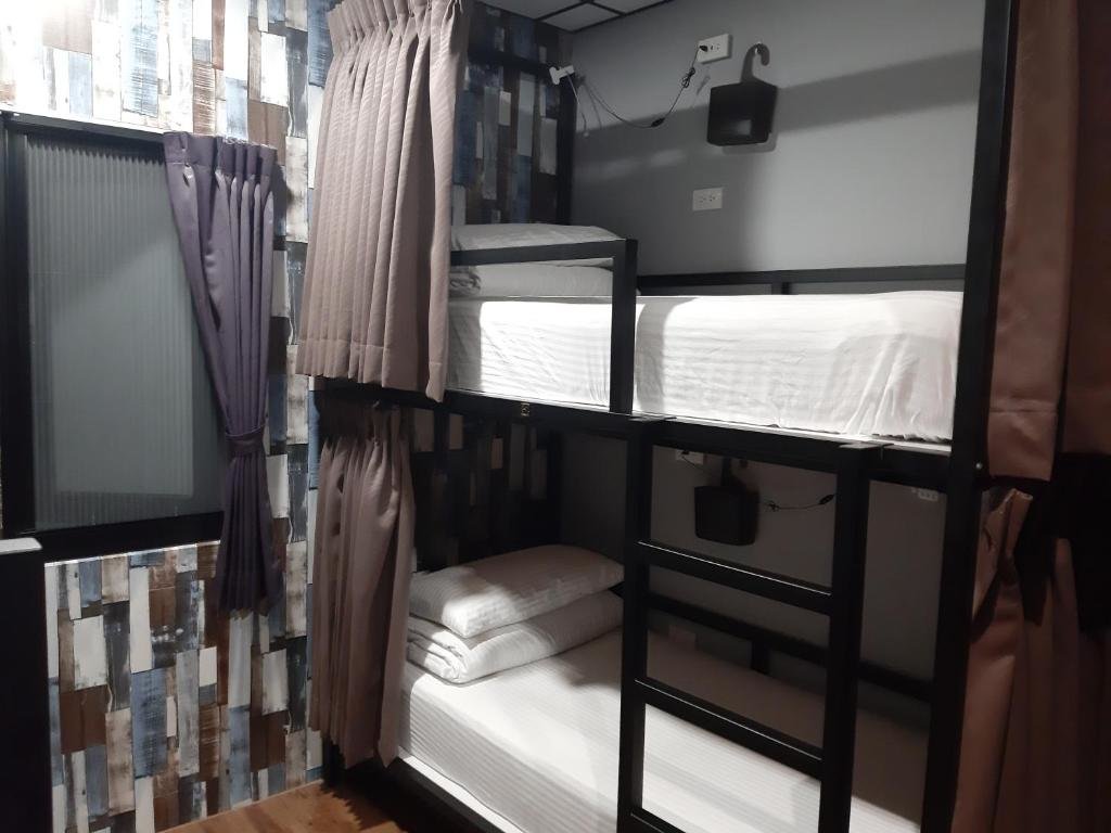 Кровать в общем номере Tainan Quiet Hostel