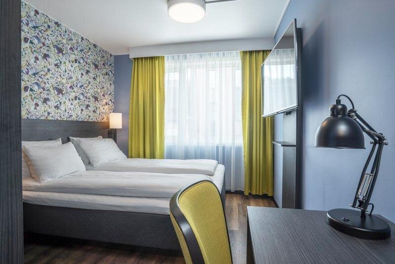 Кровать в общем номере Thon Hotel Tromsø