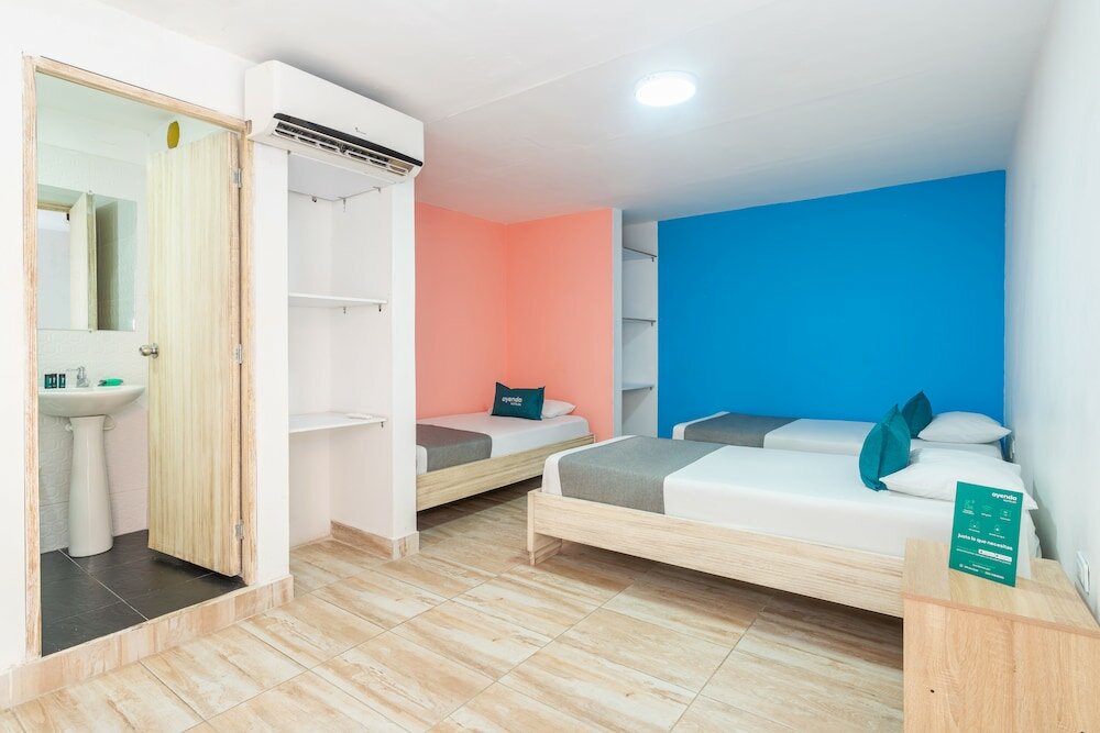 Standard quadruple chambre Ayenda Malaki