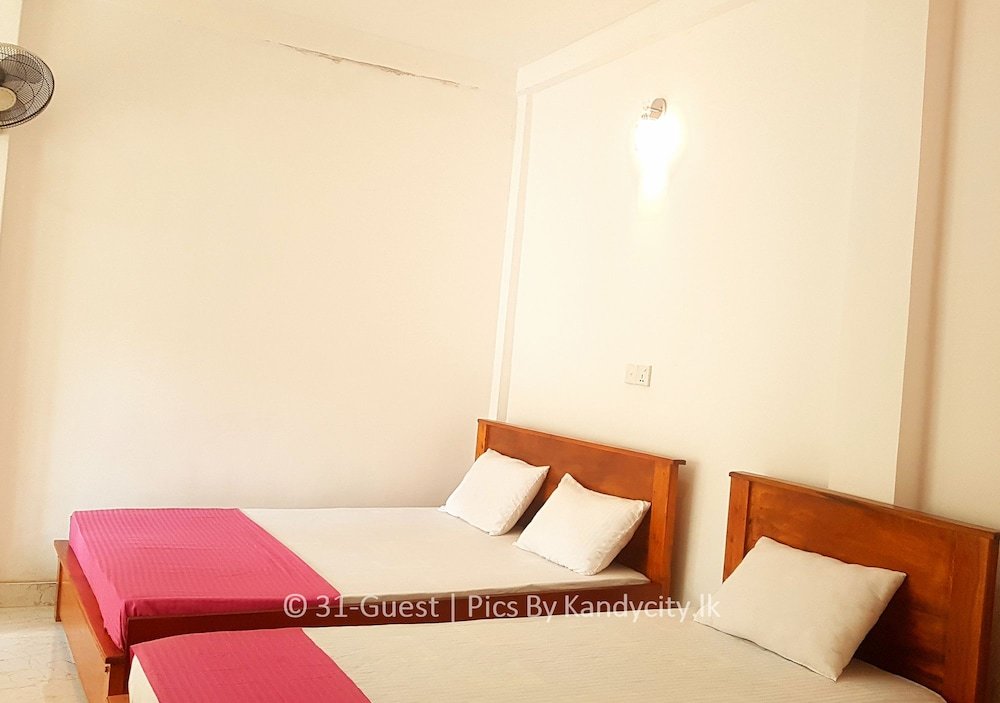 Cama en dormitorio compartido 31 Kandy Guest House