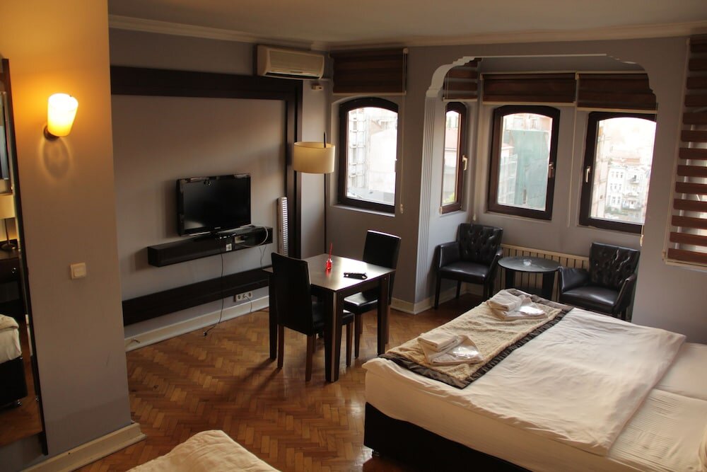 Четырёхместный номер Standard c 1 комнатой Taksim Aygunes Suite