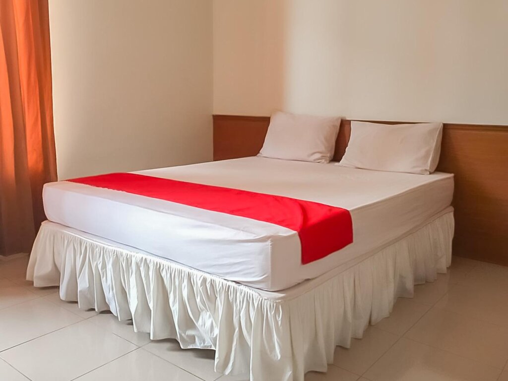 Standard Zimmer Delima Guest House Syariah