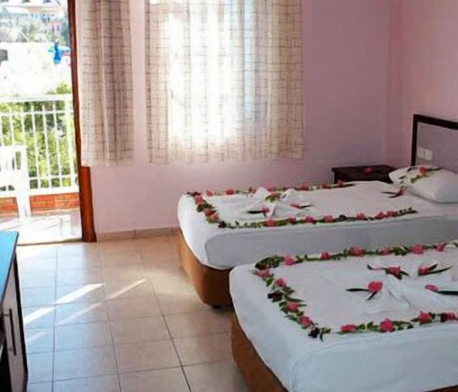 Standard Triple room with balcony Tolay Hotel