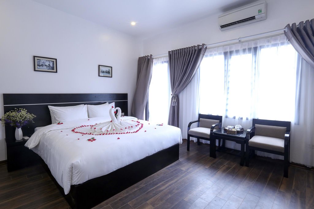 Кровать в общем номере Hanoi Starlight Boutique Hotel