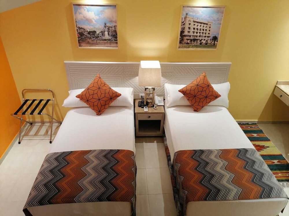 Camera doppia Standard 1 camera da letto con vista sulla città Al Madiafa