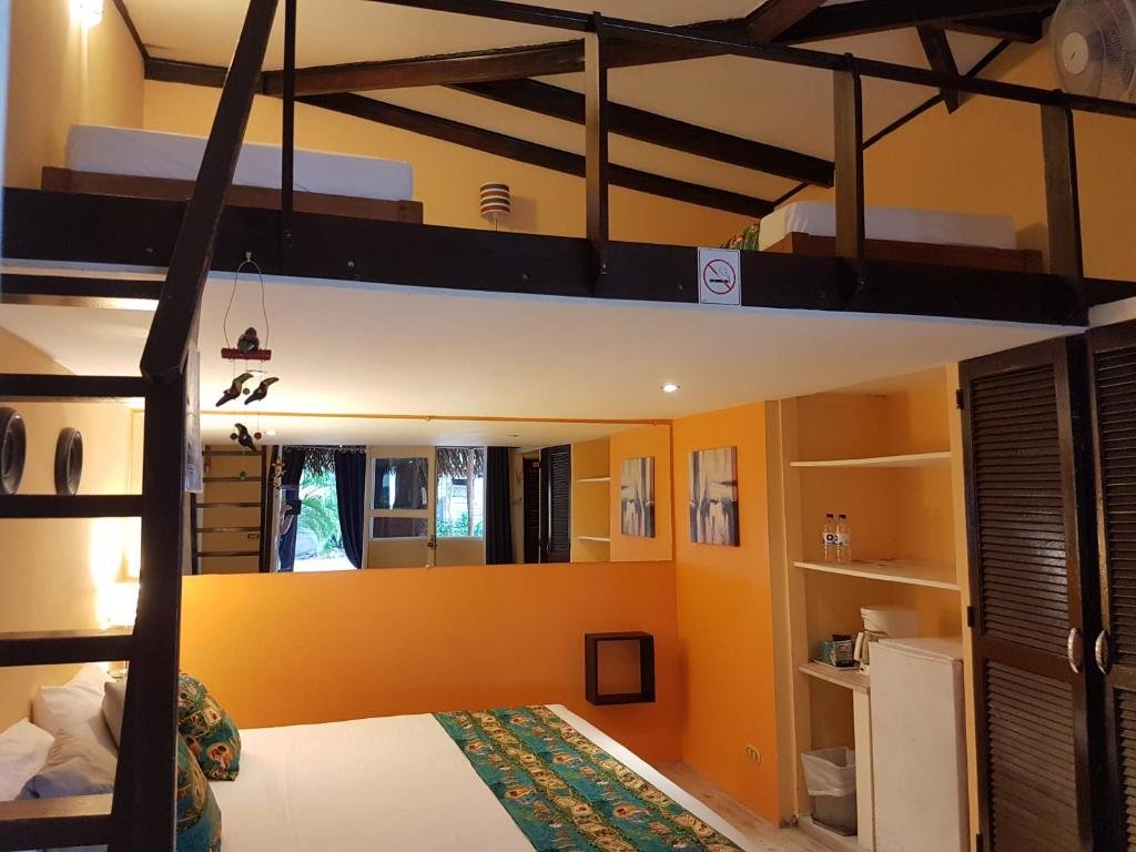 Standard Vierer Zimmer mit Gartenblick Hotel La Palapa