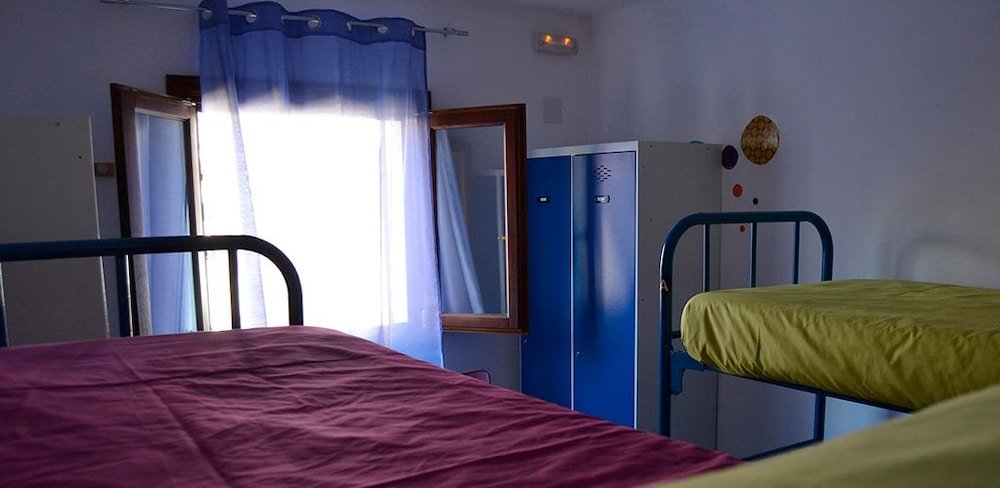 Cama en dormitorio compartido (dormitorio compartido masculino) Youth Hostel Central Palma