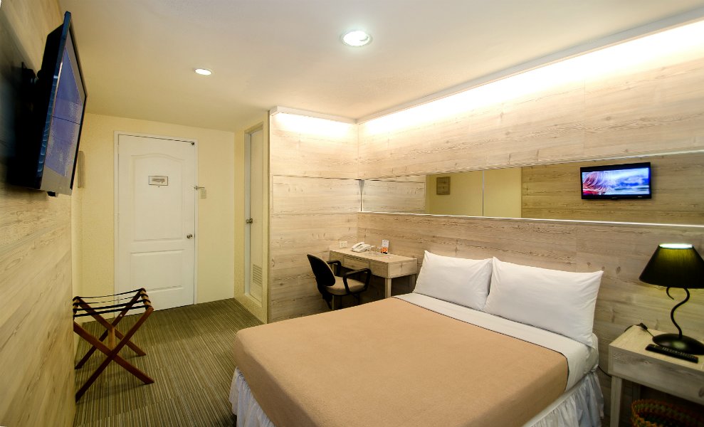 Cama en dormitorio compartido Spaces By Eco Hotel