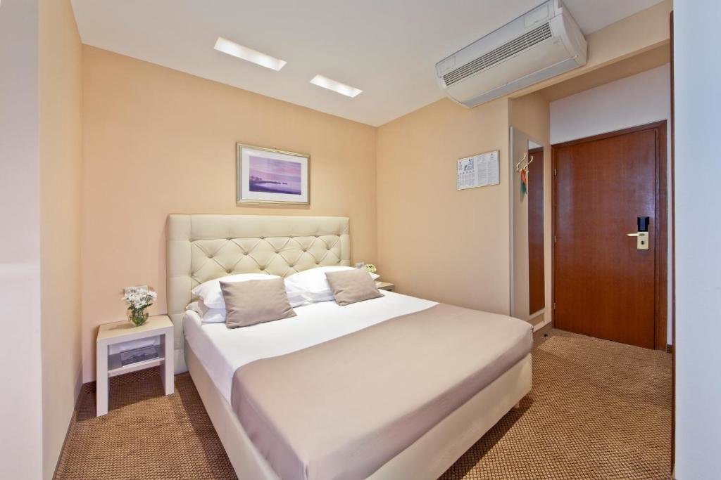 Standard Quadruple room Hotel Central