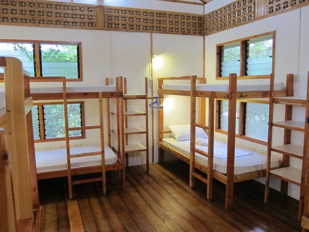 Кровать в общем номере Eskapo Verde Resort Moalboal