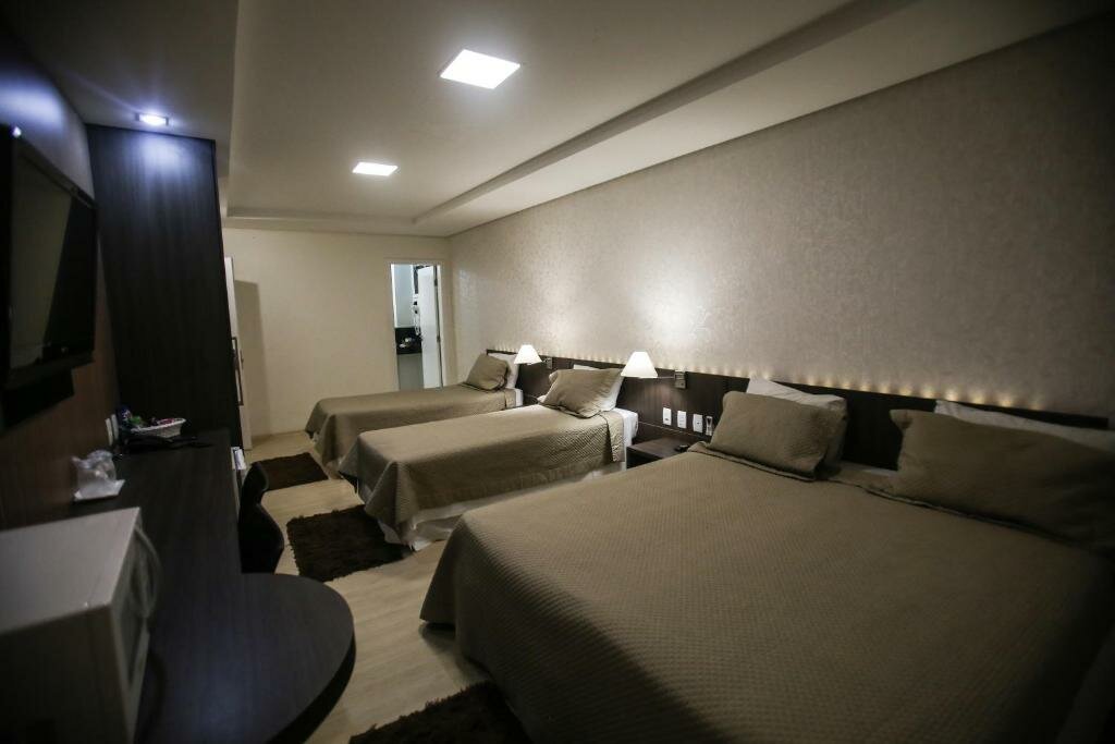 Deluxe Vierer Zimmer Gontijo Inn Hotel