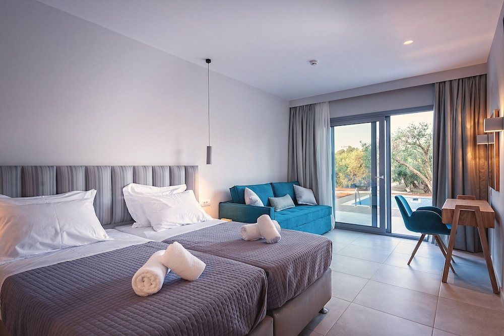 Deluxe Quadruple room with balcony Alonaki Resort