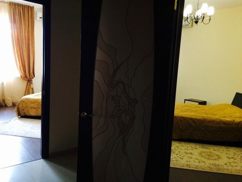Кровать в общем номере с 2 комнатами Гранд Отель Каспий