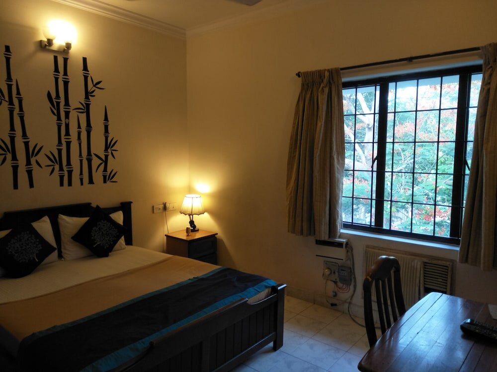 Deluxe Doppel Zimmer 1 Schlafzimmer mit Gartenblick Happy Stay Service Apartments