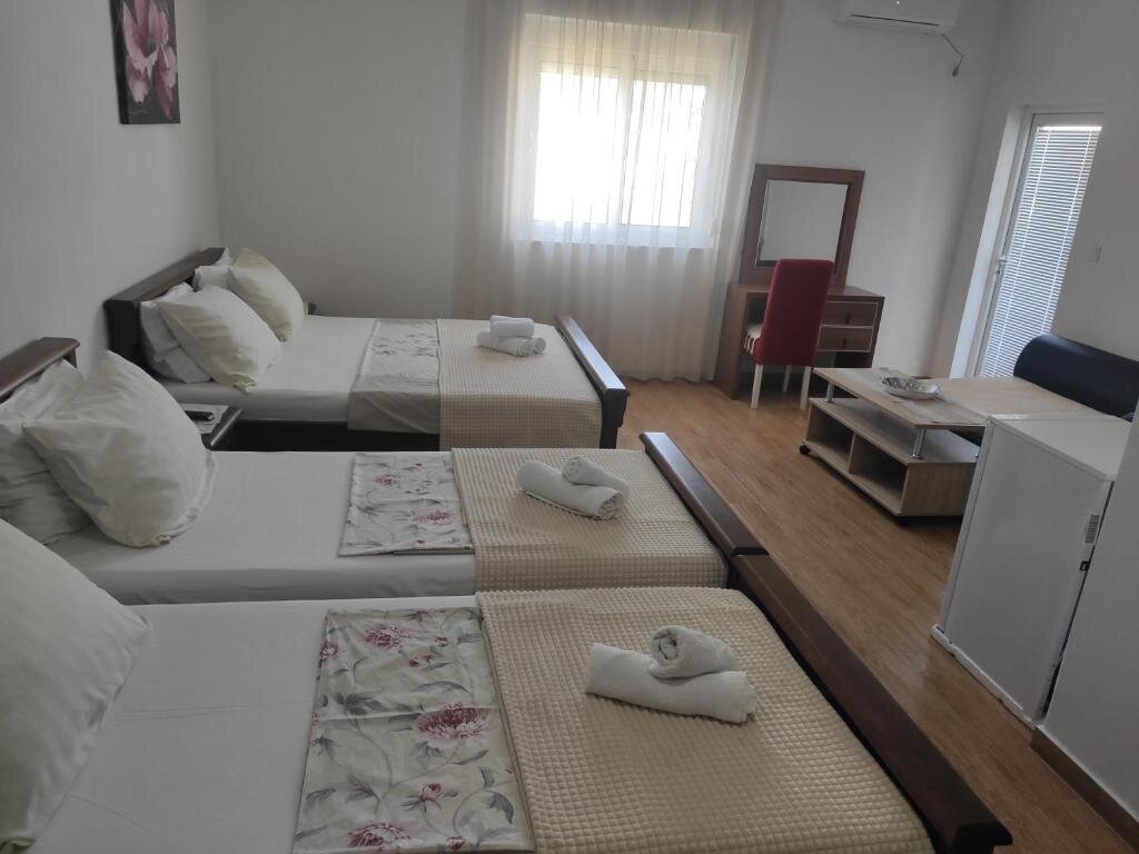 Confort quadruple chambre Robi Apartments