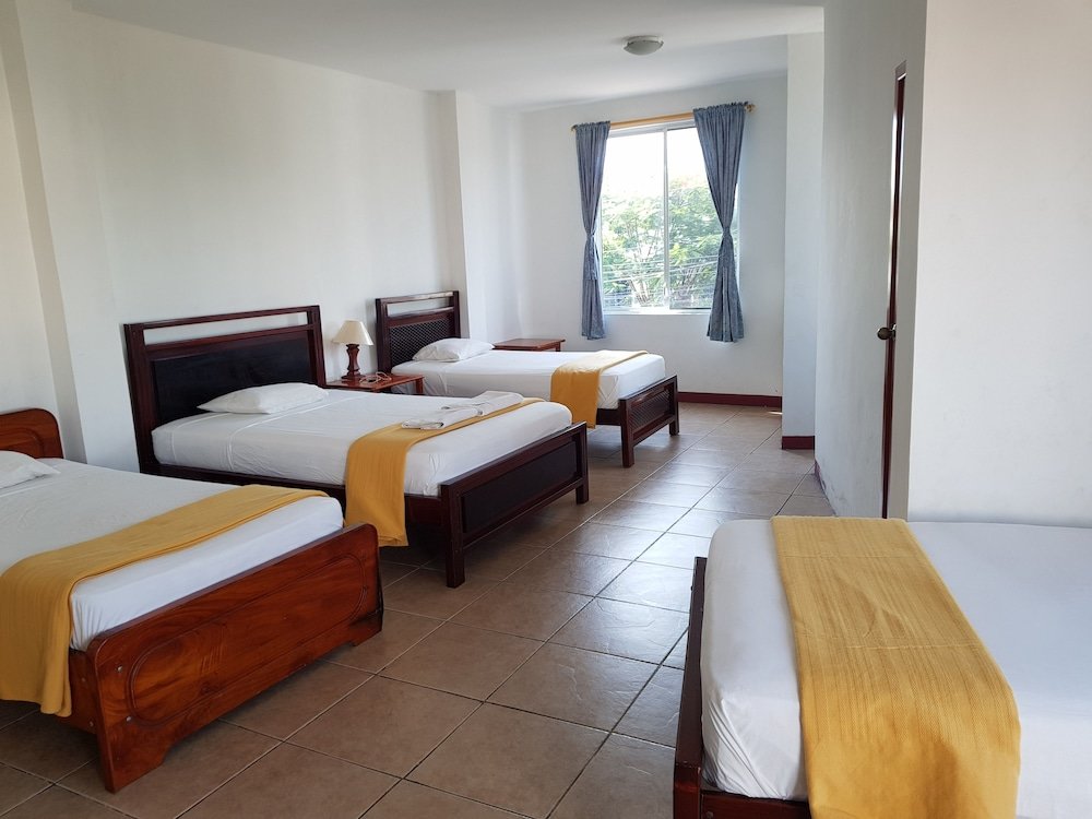 Standard quadruple chambre Gloria - Galápagos Inn
