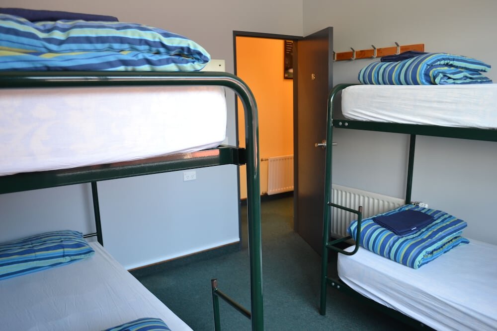Кровать в общем номере Franz Josef Montrose Backpackers