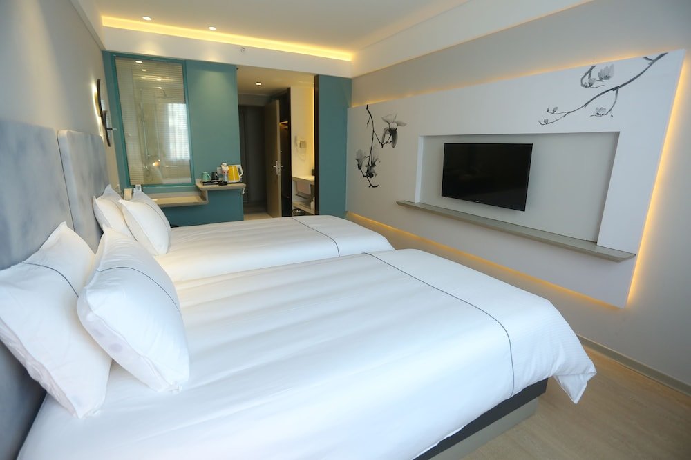 Standard Zimmer Magnotel Hotel of Qingdao JIAOZHOU, Guangzhou south road hotel