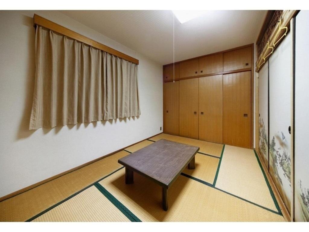 Camera quadrupla Standard Tabibitoyado Kirinya Hostel in Uji