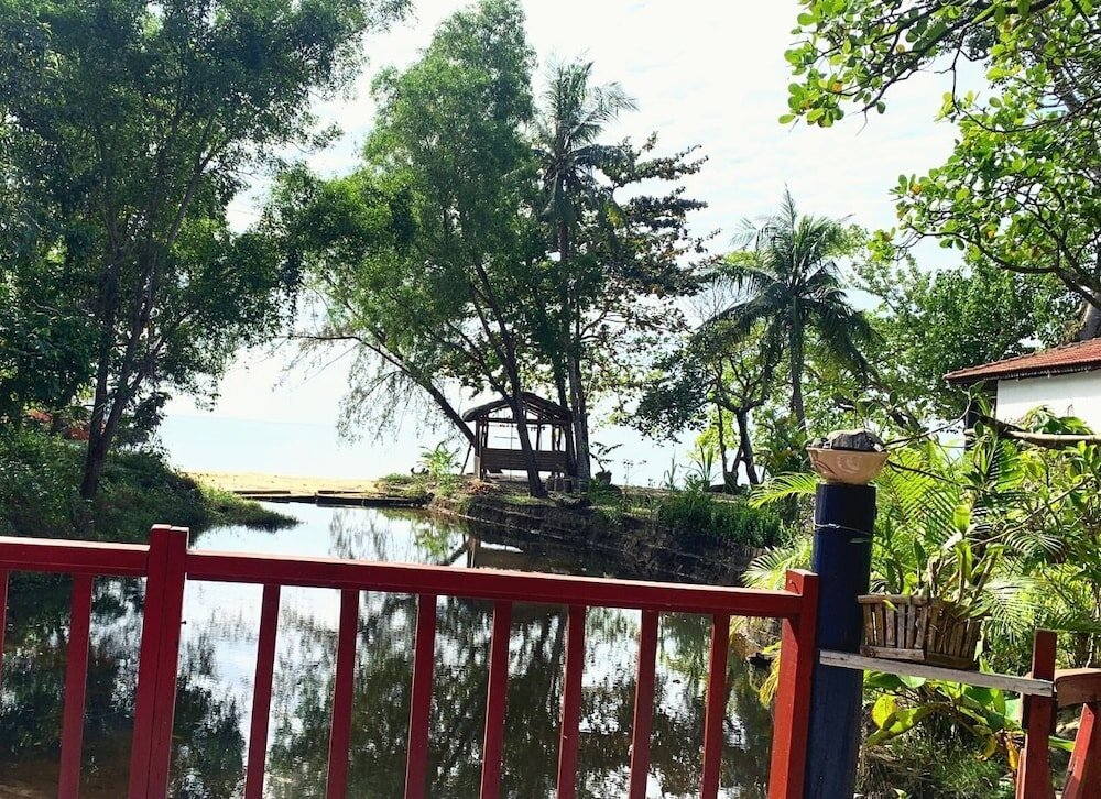 Cottage avec balcon et Vue sur la rivière Bamboo Cottages