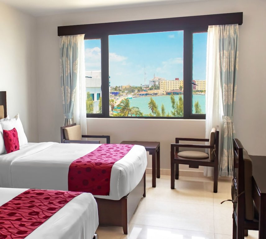 Четырёхместный номер Standard с видом на океан Golden Bay Belize Hotel