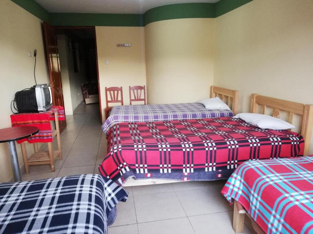 Cama en dormitorio compartido Artesonraju Hostel Huaraz