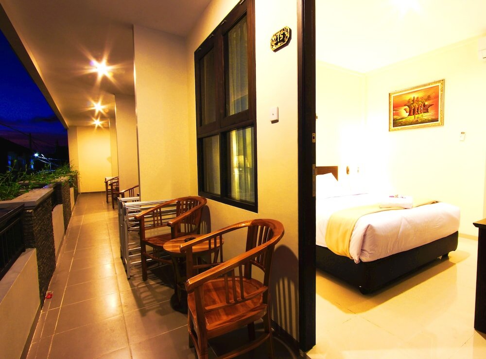 Superior room with balcony and with city view Manggar Indonesia Hotel