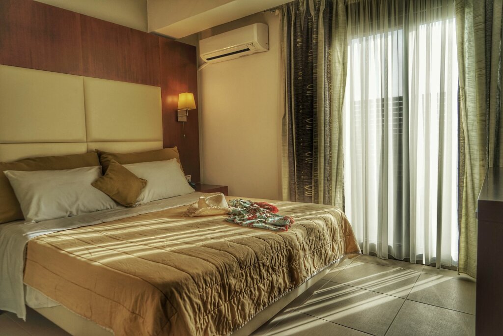 Standard Triple room with partial sea view Kokoni Beach Hotel