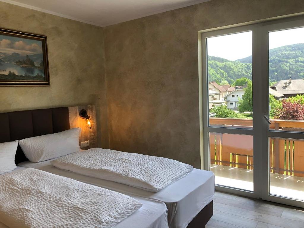 Standard quadruple chambre avec balcon Haus Kärnten