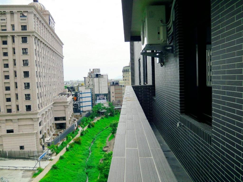 Habitación cuádruple Estándar con balcón Yixiang Spring Travel