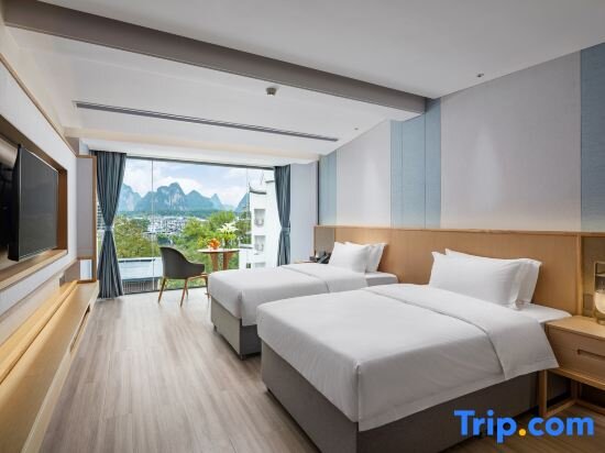 Family Duplex Suite with balcony and with river view Shixi Landscape Hotel