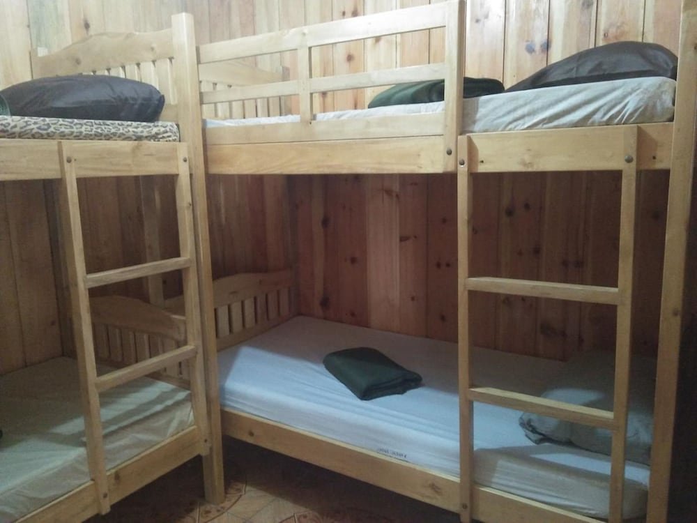 Кровать в общем номере Banaue Sunrise Guest House