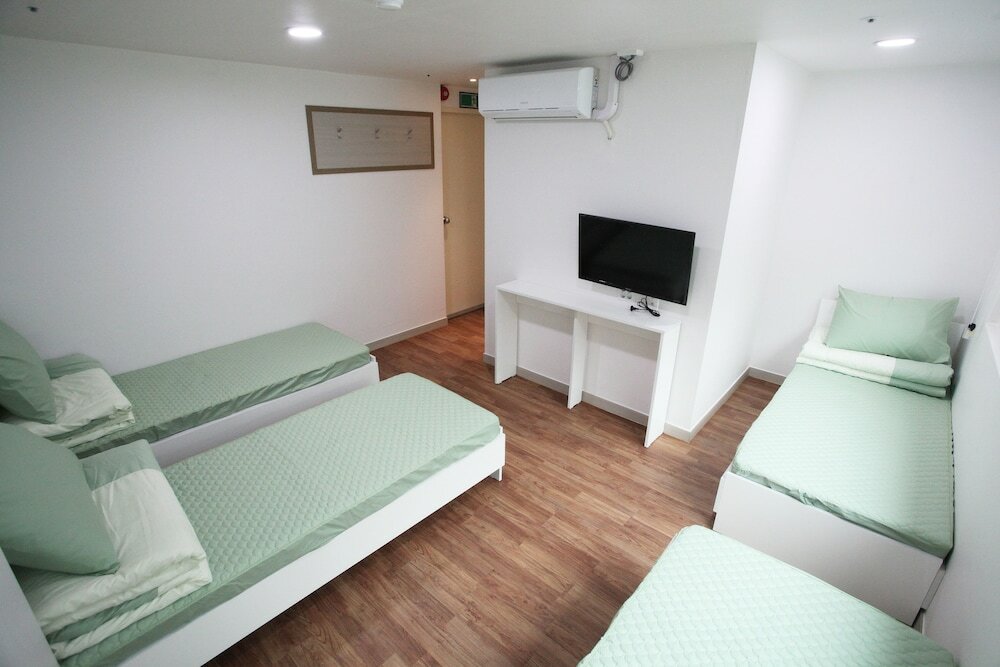 Четырёхместный номер Standard c 1 комнатой Namsan Guesthouse