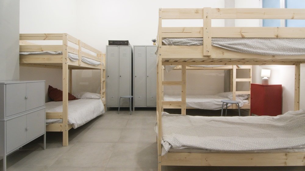 Кровать в общем номере Hostelleria