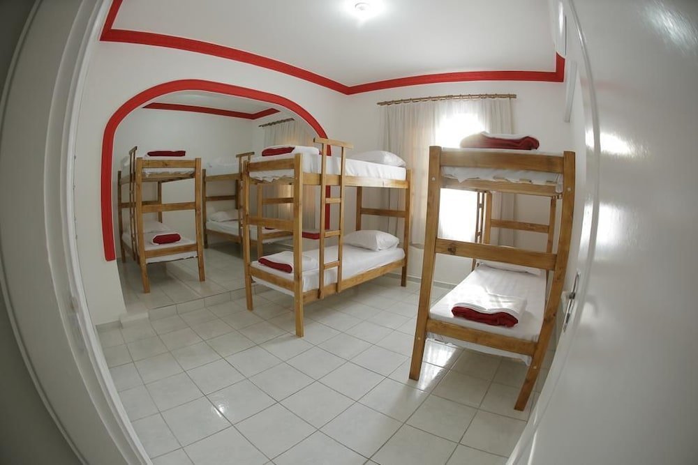 Кровать в общем номере Pousada - Aqui Hostel
