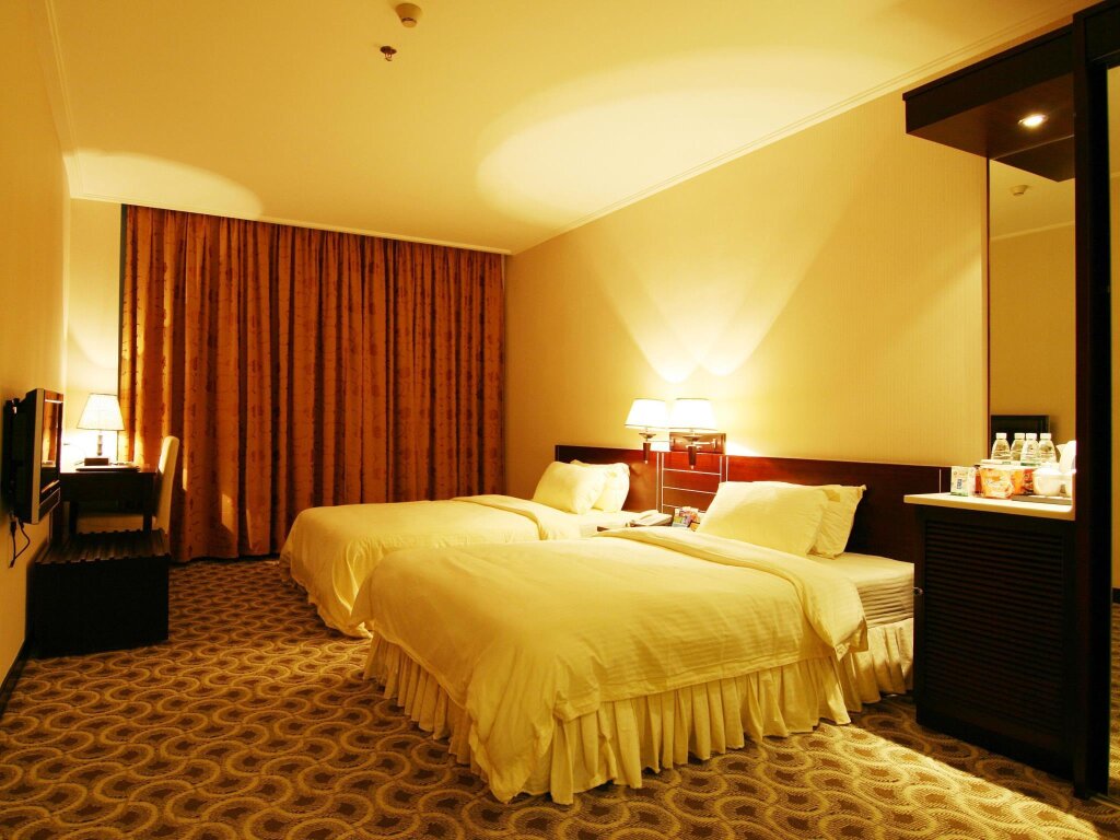 Standard triple chambre Xinzhou Hotel