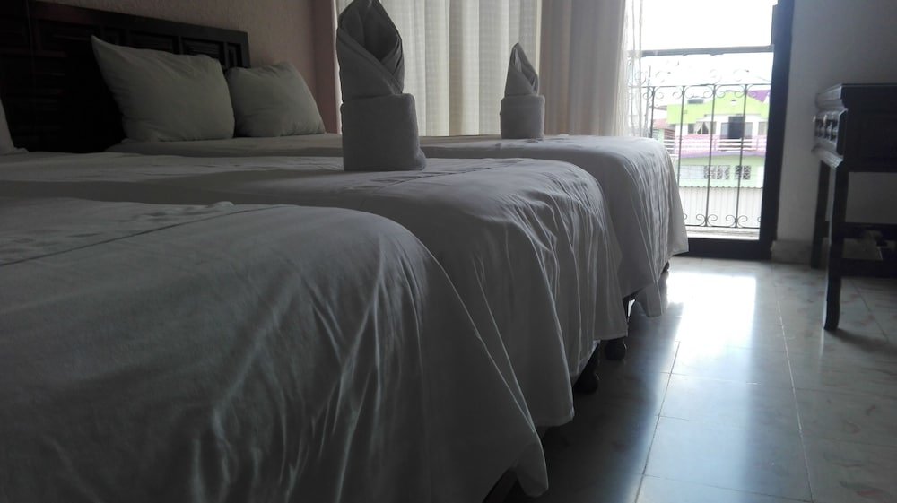 Standard Quadruple room Hotel Casa de Pakal