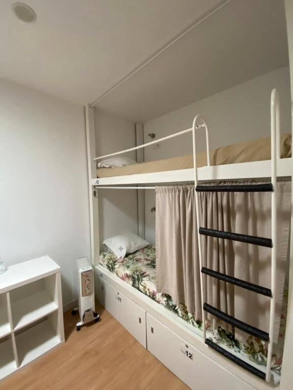 Кровать в общем номере Hostel Eleven