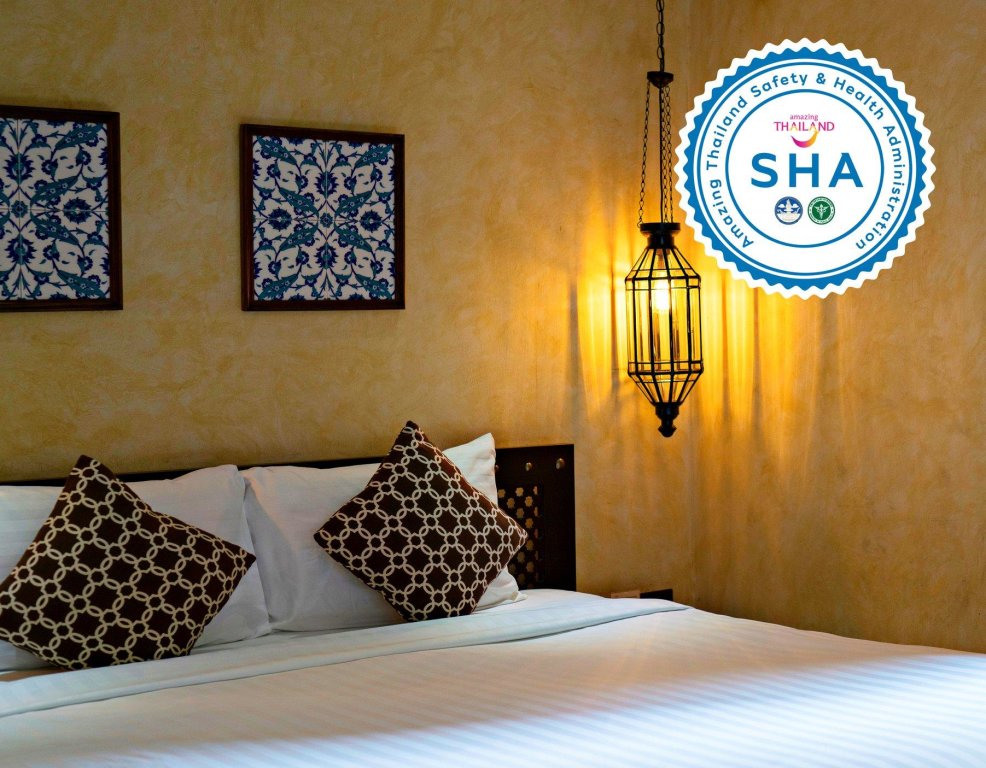 Кровать в общем номере Dewan Bangkok - SHA Certified