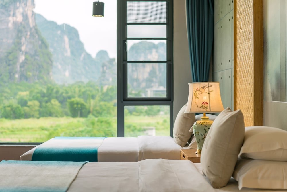 Deluxe Triple room with mountain view Yangshuo Zen Garden Resort