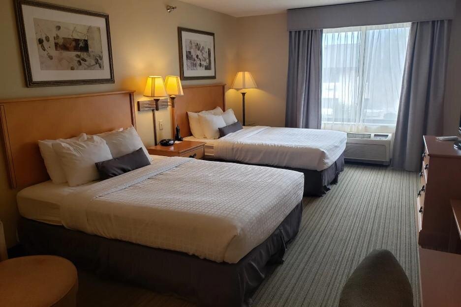 Deluxe Vierer Zimmer Coon Rapids North Metro Hotel to Norwood Inn & Suites