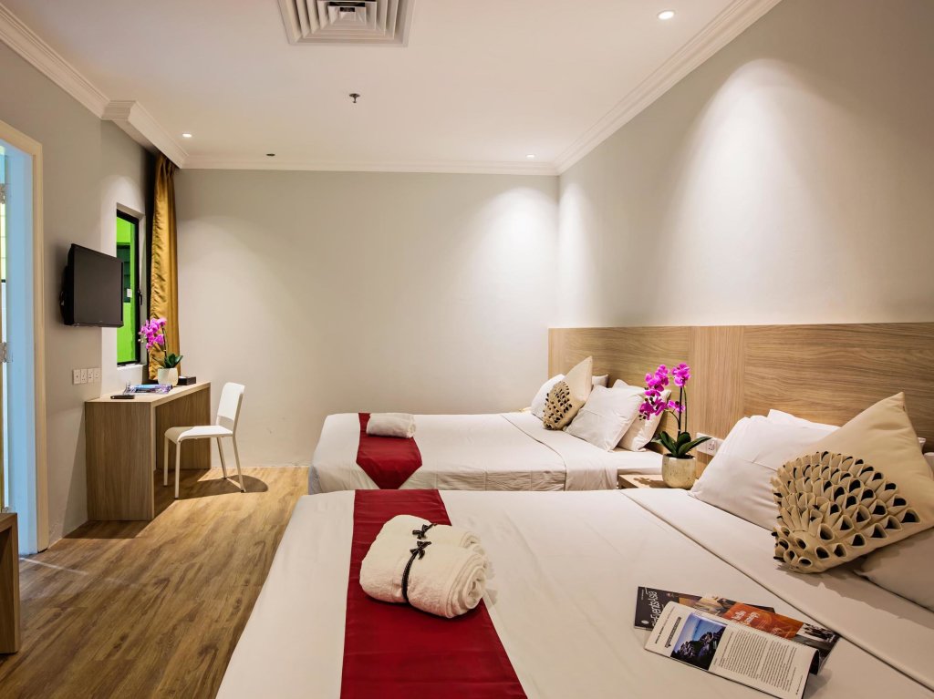 Четырёхместный семейный номер Standard Hotel Wira Kuala Lumpur