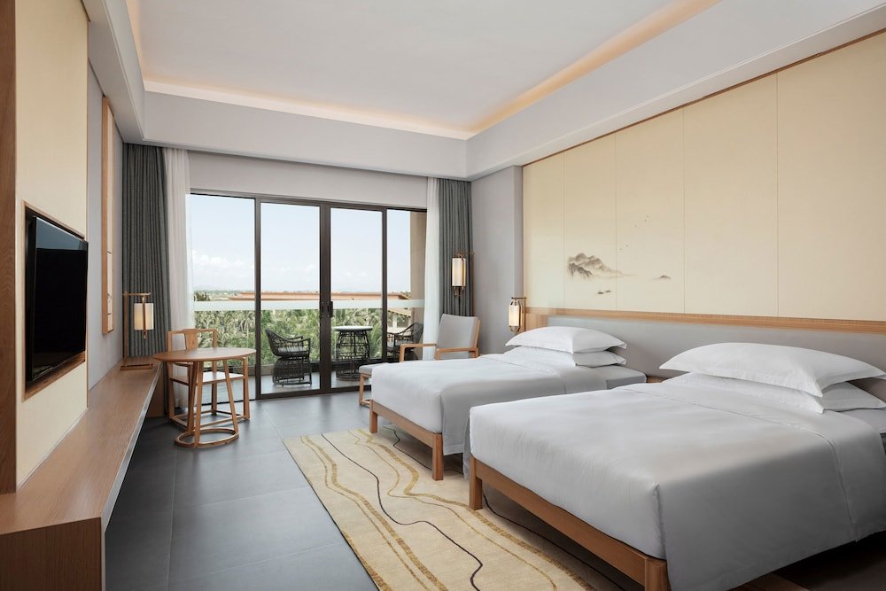 Standard Vierer Zimmer mit Balkon und mit Gartenblick Sheraton Maoming Romantic Beach Resort
