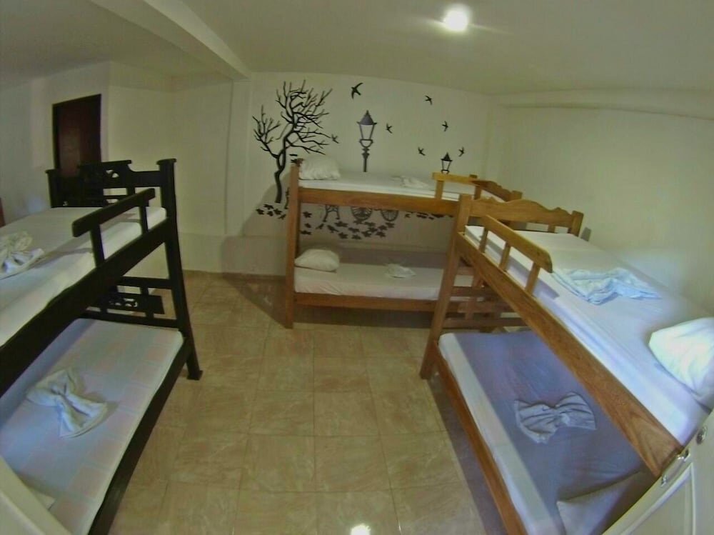 Кровать в общем номере Hostal Getsemaní
