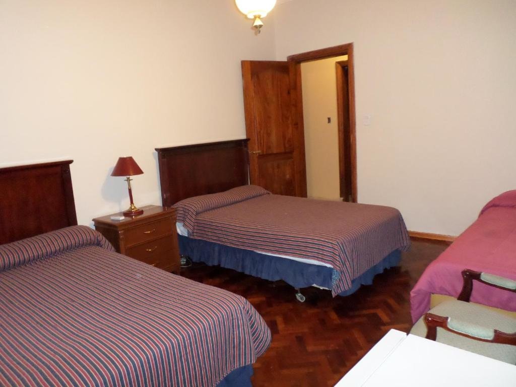 Кровать в общем номере Alojarse en Mendoza B&B