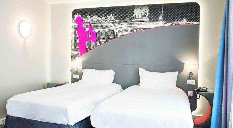 Кровать в общем номере Hotel Inn Design Paris Place d’Italie