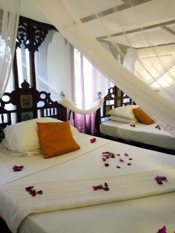 Deluxe Doppel Zimmer 1 Schlafzimmer mit eingeschränktem Meerblick Imani Beach Villa