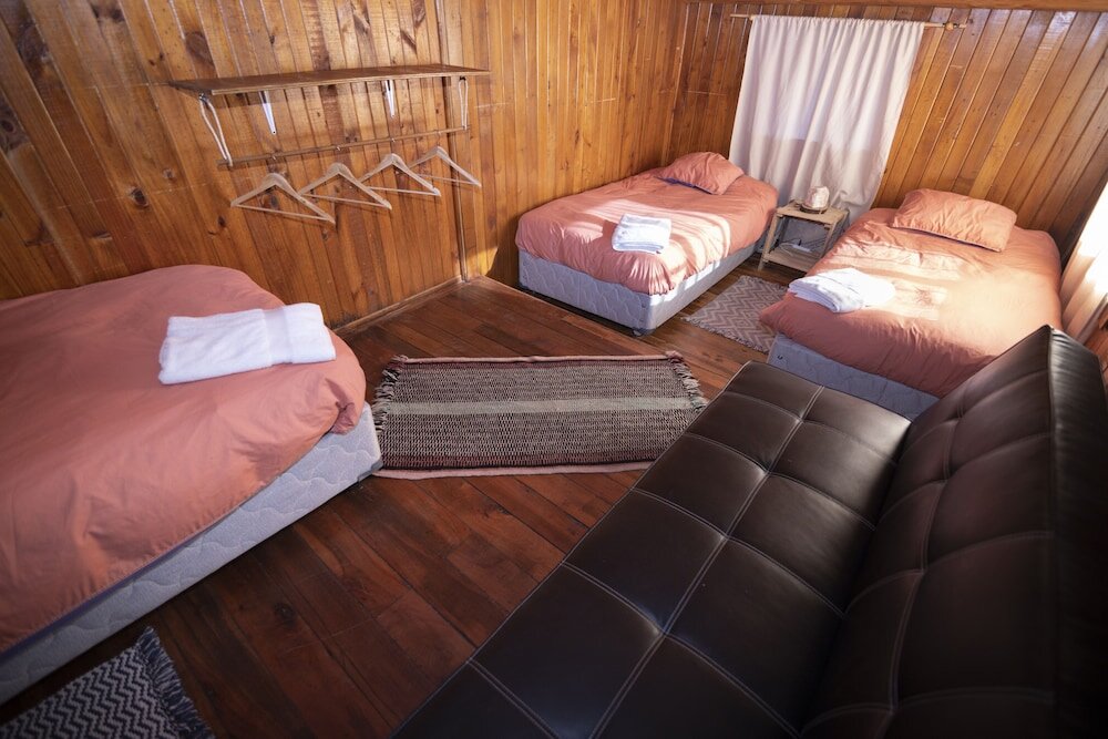 Кровать в общем номере Hostal Cuatro Estaciones