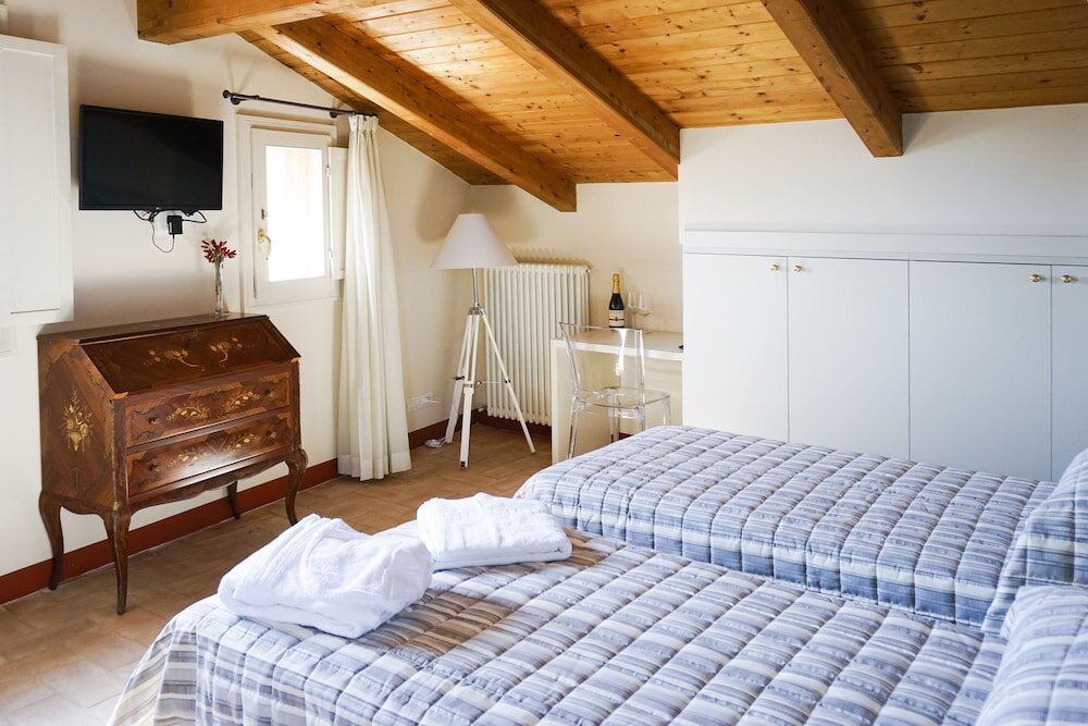 Standard triple chambre Vue sur la ville Casa Isolani - Santo Stefano