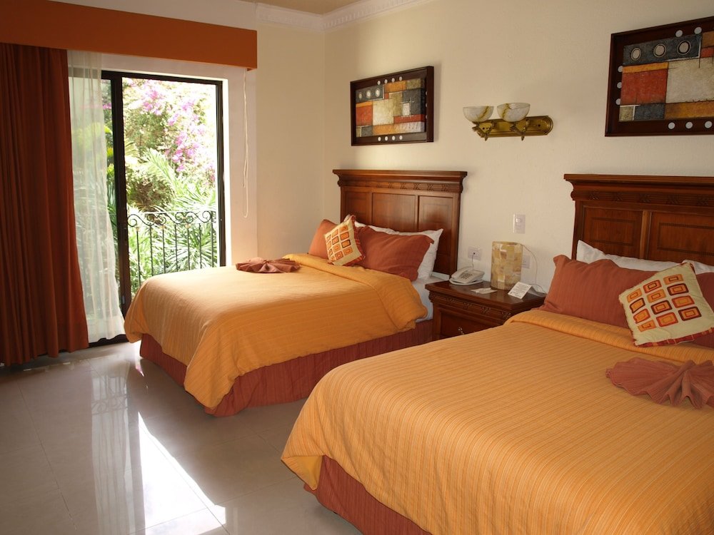 Junior suite quadrupla con balcone Gran Real Yucatan